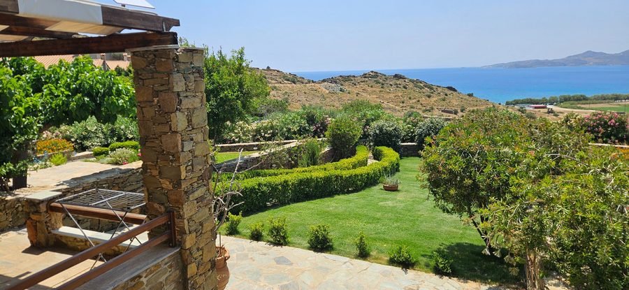 Aetos Retreat patio overlooking the garden and Aegean sea