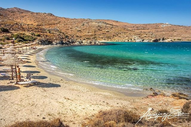 Agia Paraskevi Beach with umbrellas and turquoise water