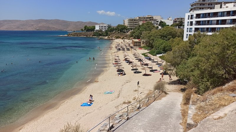 Psili Ammos beach with umbrellas and turquoise water